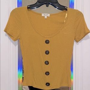 yellow button shirt